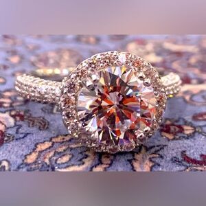 Size 7 solitaire with halo and beautiful band setting . Over 3 carats of stones